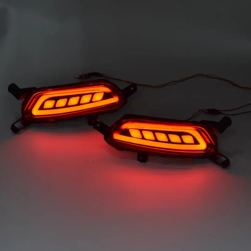 Pair of black LED brake light bulbs for Mazda car application displayed on white background