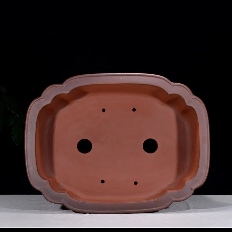 Large Chinese style purple clay flowerpot with antique jade finish and tree stump decoration