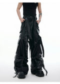 Black retro-style loose pants with multiple pockets and quilted stitching detail.