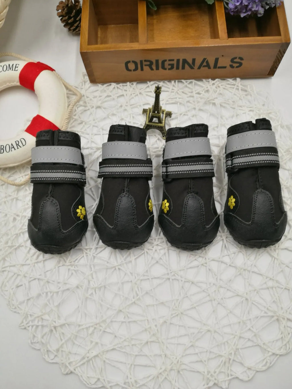 Black waterproof dog shoes with non-slip PVC sole, adjustable fuzzy belt