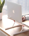 White portable laptop bracket with heat sink base in folded position.
