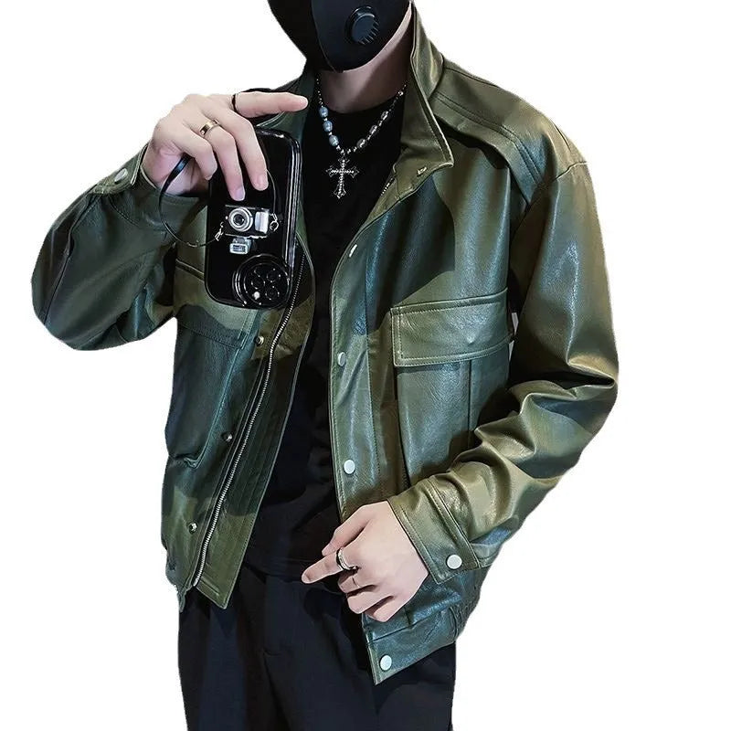 Men's black Korean style PU leather jacket with side pockets and straight hem on a hanger.