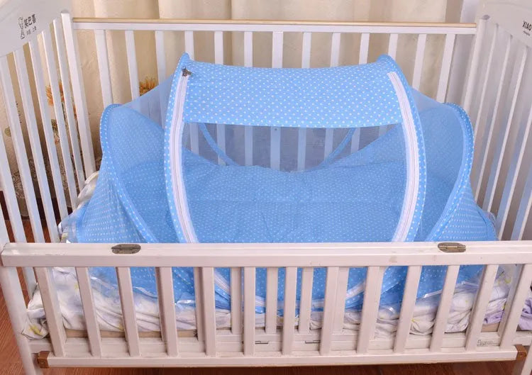 Foldable baby bed net 110x65x60cm with mattress and pillow in blue or pink mesh and steel wire frame