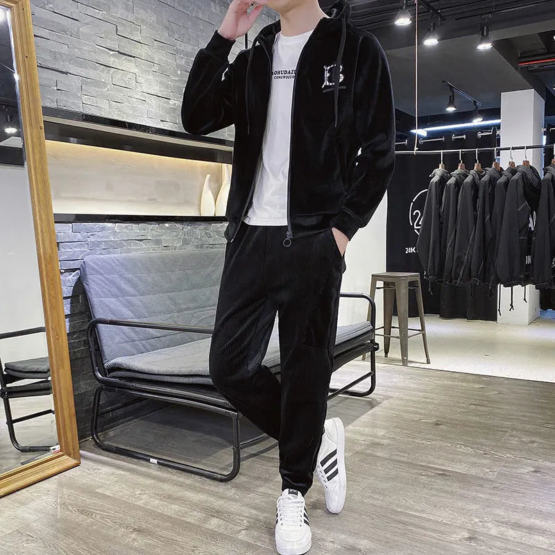 Gold velvet sports suit for men in black featuring a seven-sleeve top and trousers with size M to 4XL options