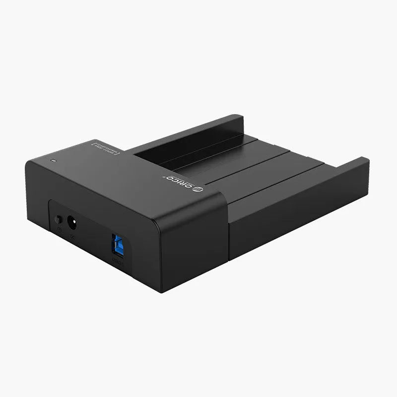 Black universal hard drive enclosure for 2.5-inch and 3.5-inch SATA drives with USB cable