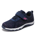 Women's wedge heel shoes with mesh uppers and velcro fastening in four colour options