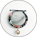 Cat collar with small Japanese bell made from cotton, linen, and copper, available in Black big flower and Red plum