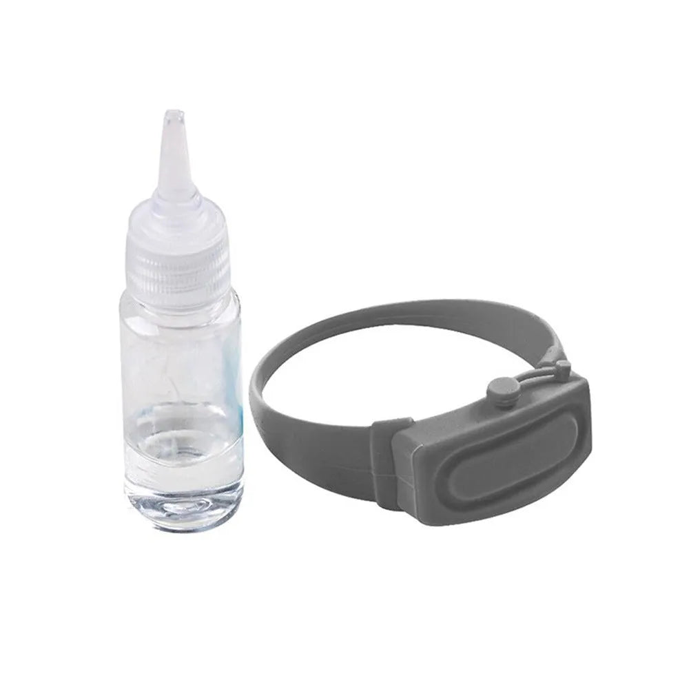 Portable hand sanitizer dispenser bracelet in silicone TPU with two refill caps, shown on a wrist