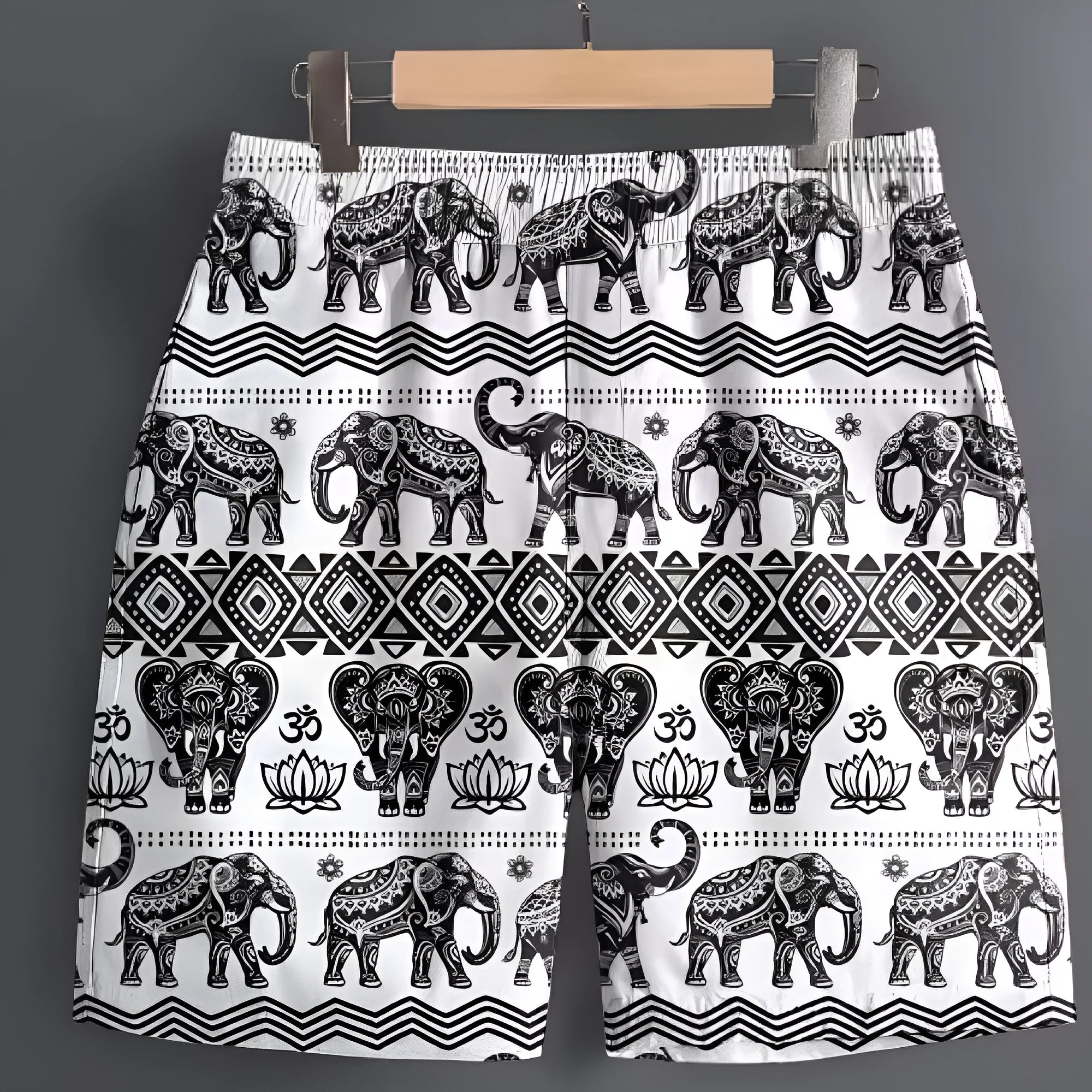 Men's polyester casual shorts in camouflage pattern on a size chart background.