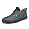Men's brown casual leather-style boots with a front zip, round toe, and mid-calf height.