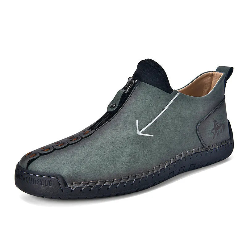 Men's brown casual leather-style boots with a front zip, round toe, and mid-calf height.
