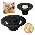 Set of four black plastic steamed bun molds for making dumplings and shaomai
