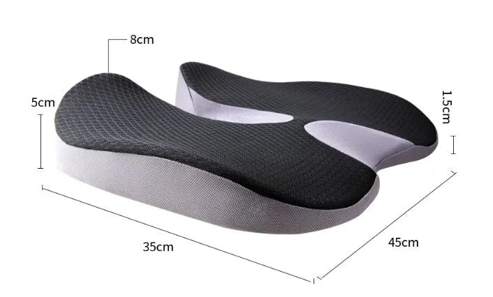 Curved bevel seat cushion in beige colour on a car seat, designed for tailbone support.