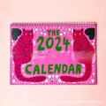 A4 paper wall calendar with cat-themed artwork for monthly planning, available for 2024 or 2025.
