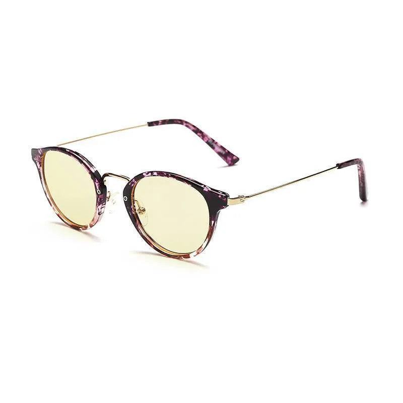 Anti-blue light literary glasses frame in PC material showing bright black, amber, purple and purple leopard colour options.