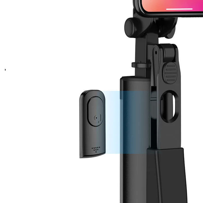 Black aluminium alloy Bluetooth selfie stick tripod extended with phone attached, showing remote control.