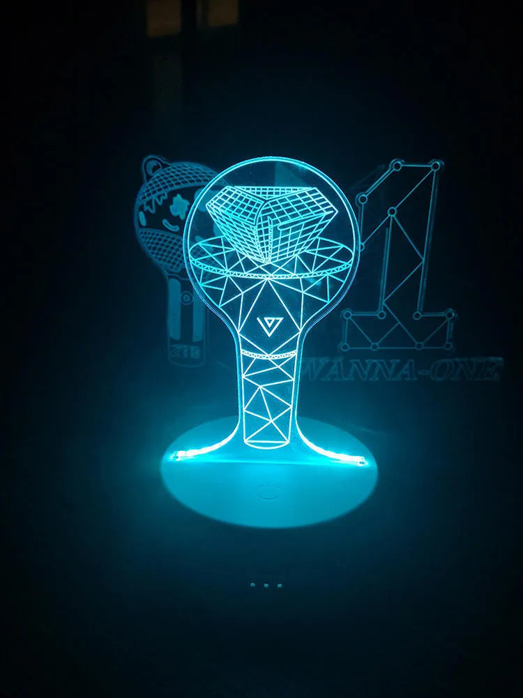 Clear acrylic display stand supporting 101 Tower Gem BTS lamp with universal voltage compatibility