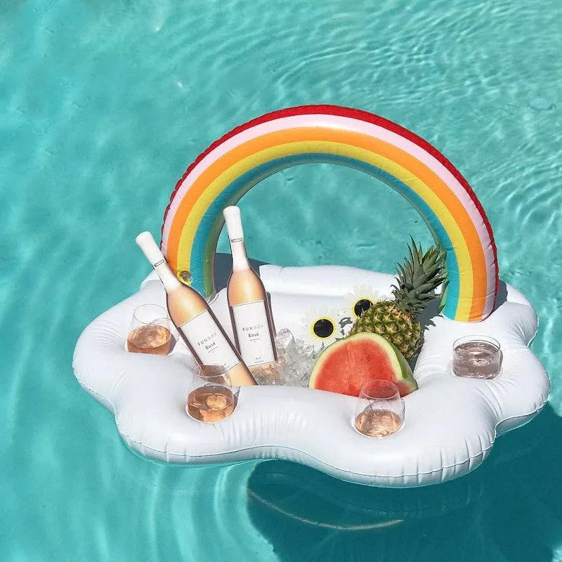 Rainbow inflatable pool float cooler with cloud shape and four glass holders floating on blue water