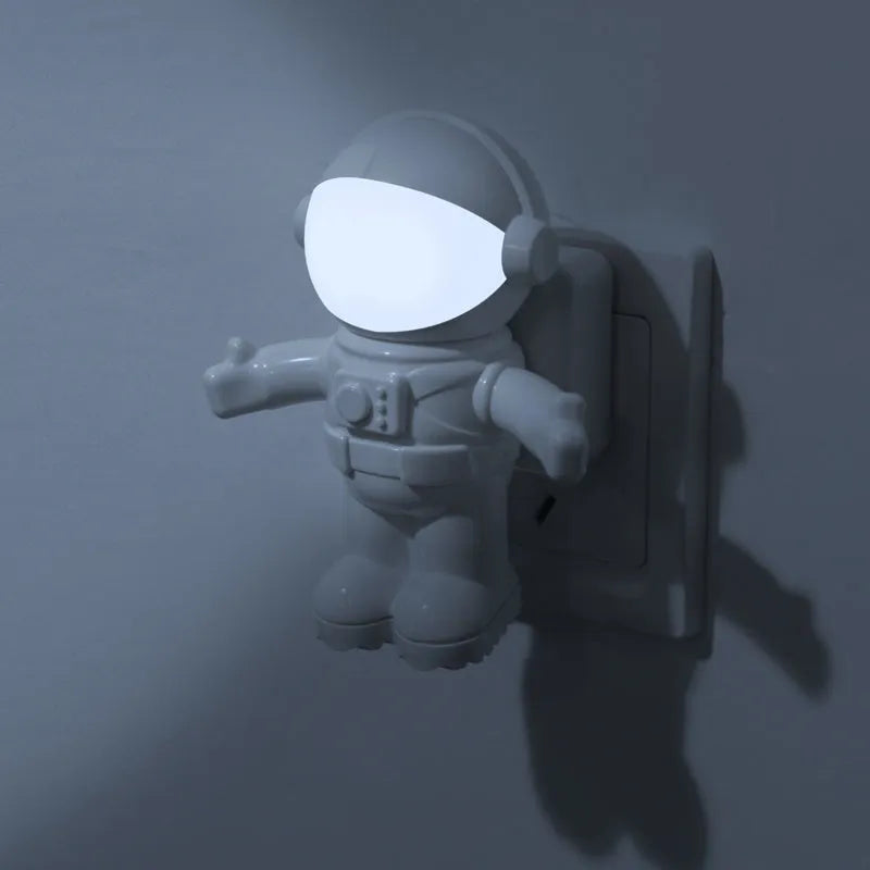 Astronaut USB LED desk lamp with flexible gooseneck and helmet switch on a desk