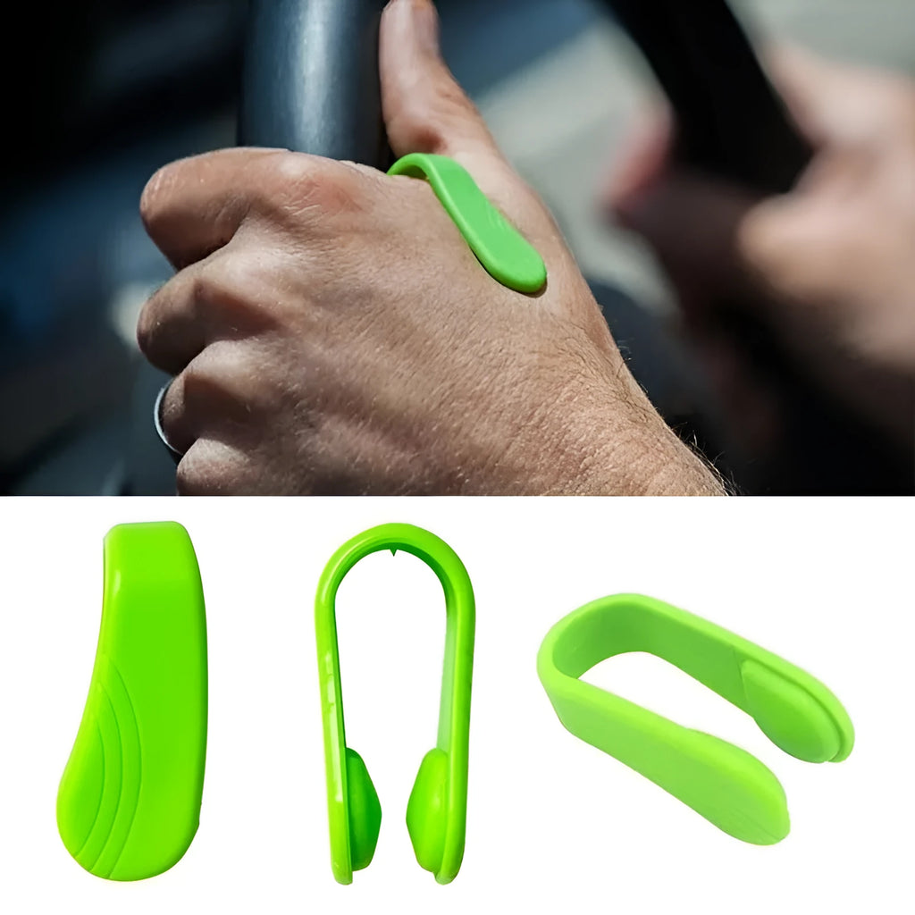 Tiger mouth massage clip multi-function acupoint massager in black on a hand, showing placement between thumb and index finger