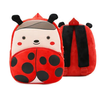 Children's plush animal backpack with elephant design showing dimensions and zipper opening