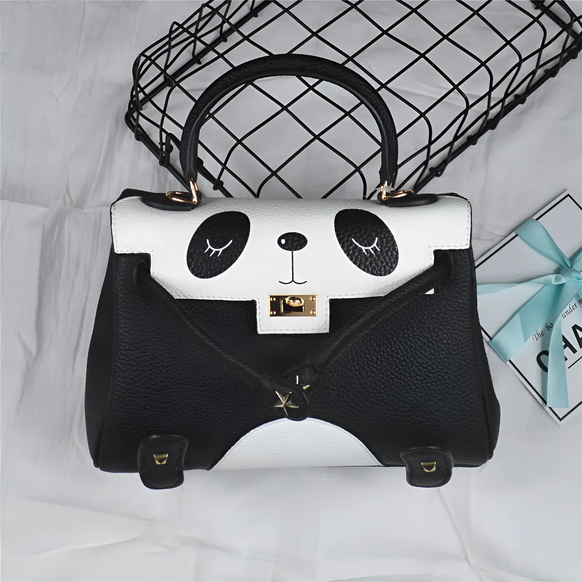 Panda print cow leather handbag with square shape in horizontal orientation