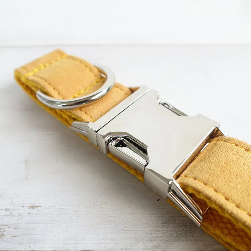 Yellow velvet adjustable dog collar with polyester construction, shown in five sizes from XS to XL