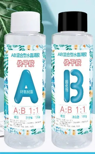 Quick-curing AB epoxy resin kit with two bottles for DIY jewellery and craft projects.