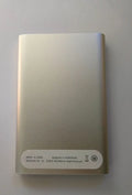 2.5 inch metal external hard drive in black with USB 3.0 cable and indicator light