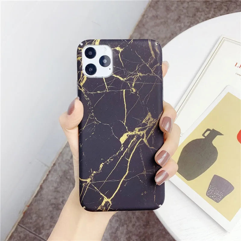 Marbled geometric pattern on a black mobile phone back cover case.