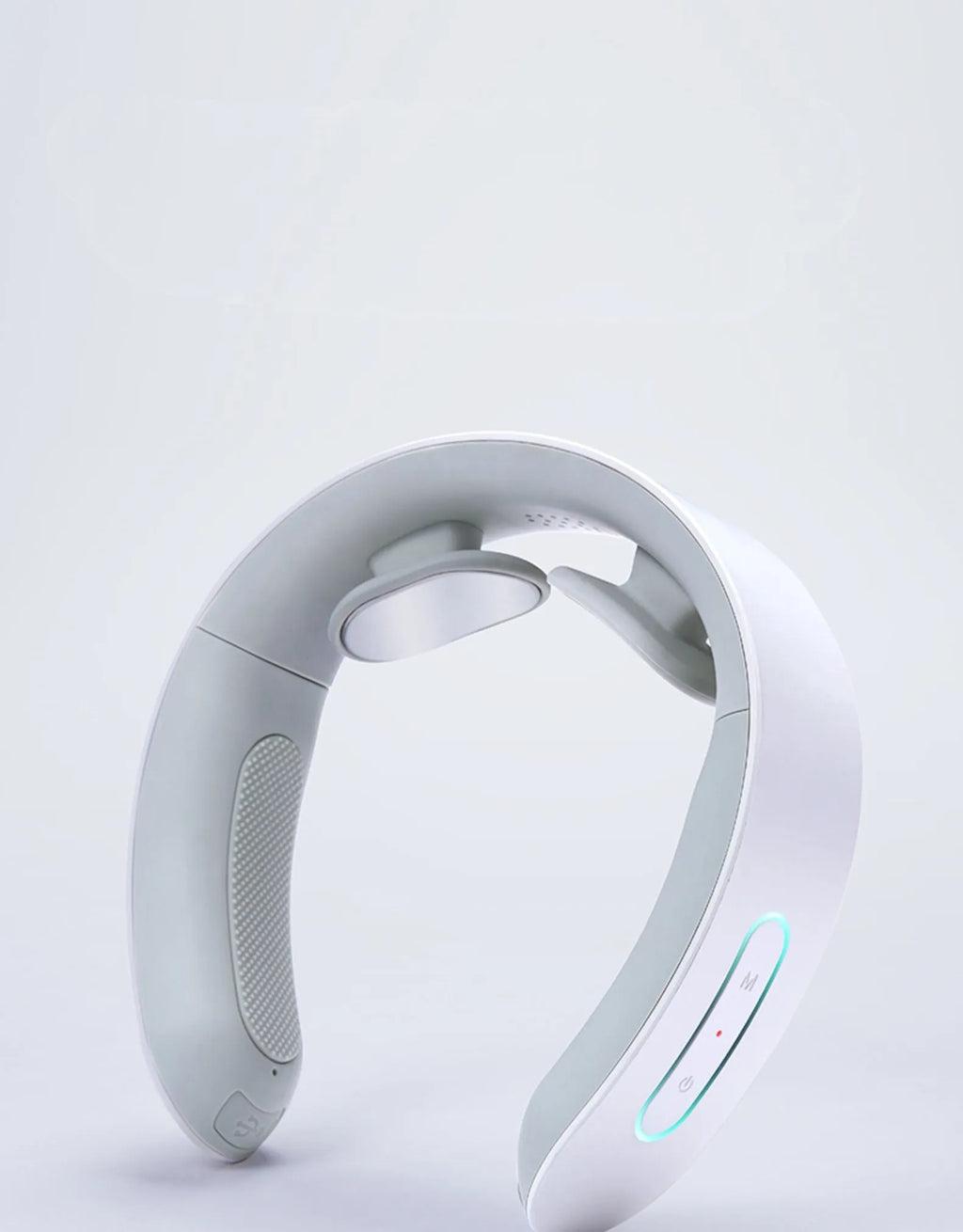 White electric acupressure handheld massager for back neck and shoulder pain relief.