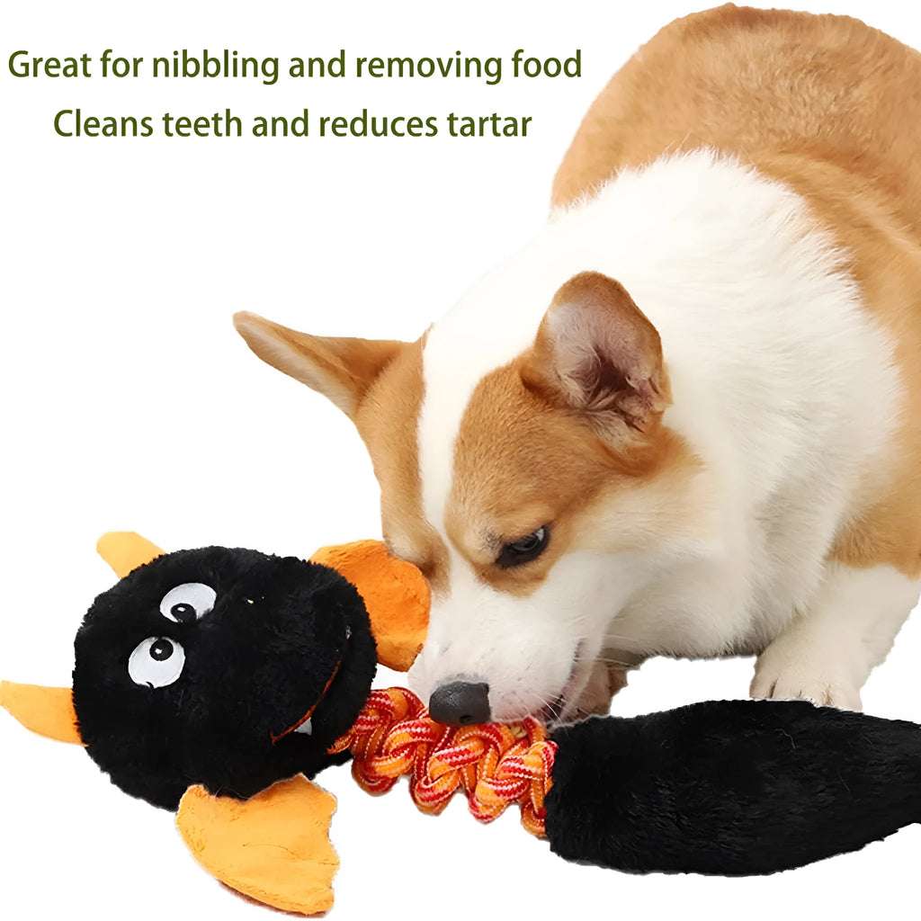 Large black plush dog toy with a rope knot, showing cartoon shape and soft texture.