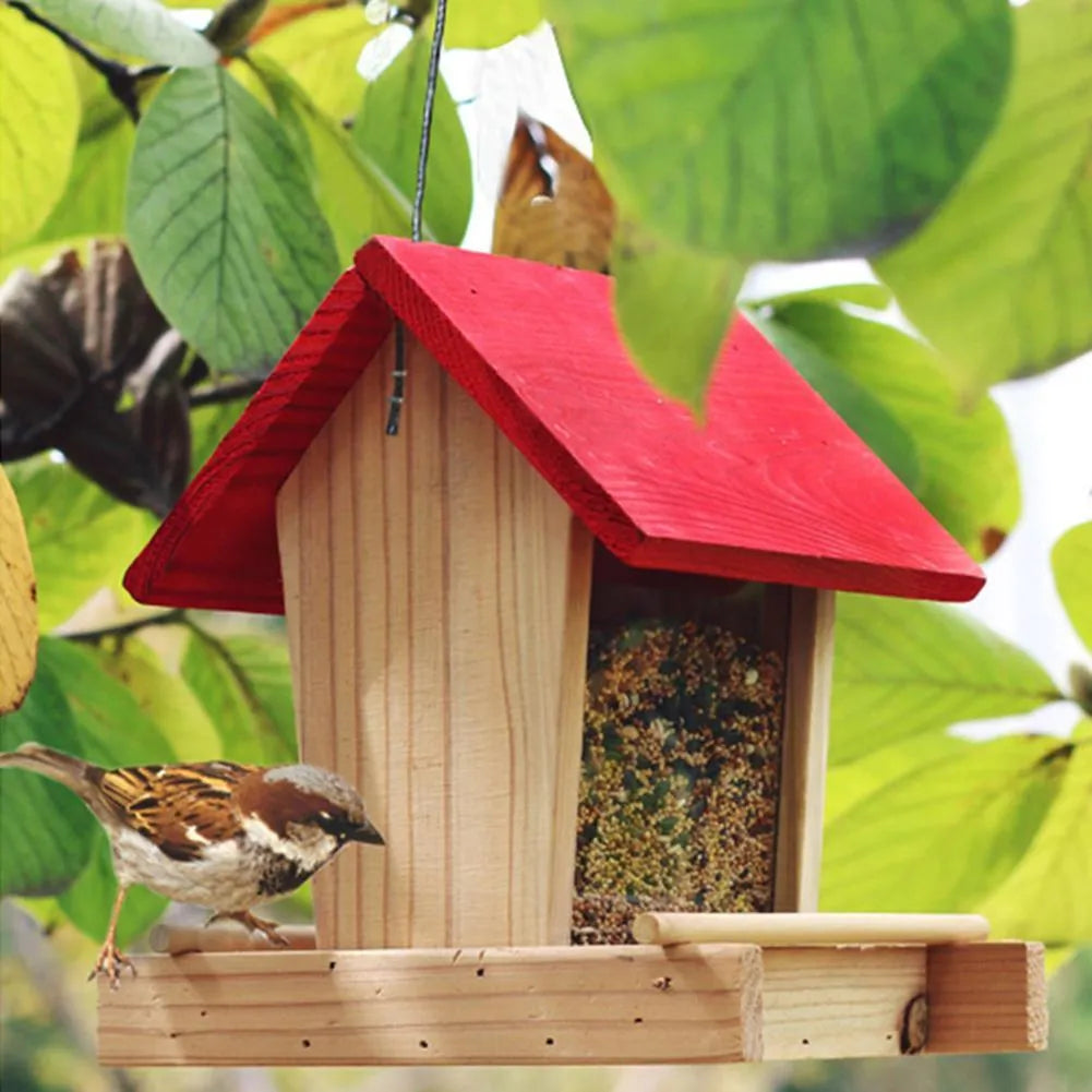 Suspended pine wood bird feeder with red roof and log texture finish
