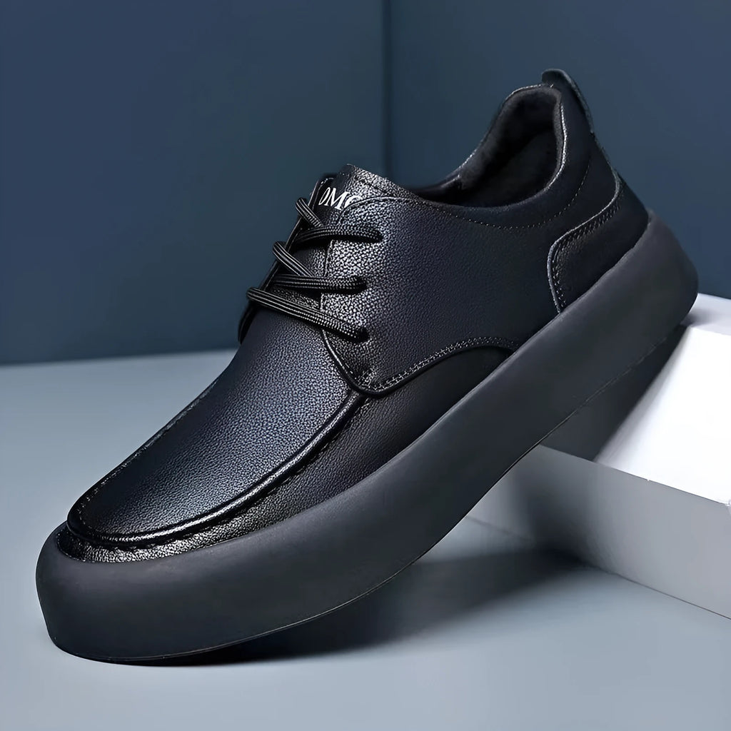 Men's brown casual lace-up shoes with round toe and flat platform sole on a white background.
