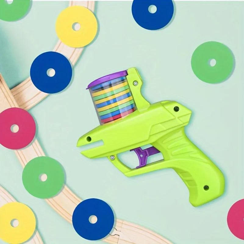Interactive cat toy launcher with foam disc, available in green and purple colours