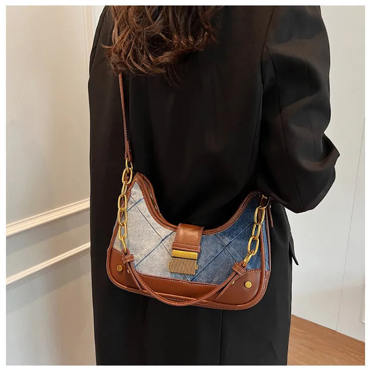 Brown denim women's bucket shoulder bag with chain straps and diamond mesh detailing