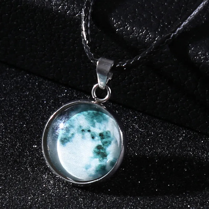 Luminous alloy pendant necklace with constellation design in coloured glass, showing extension chain