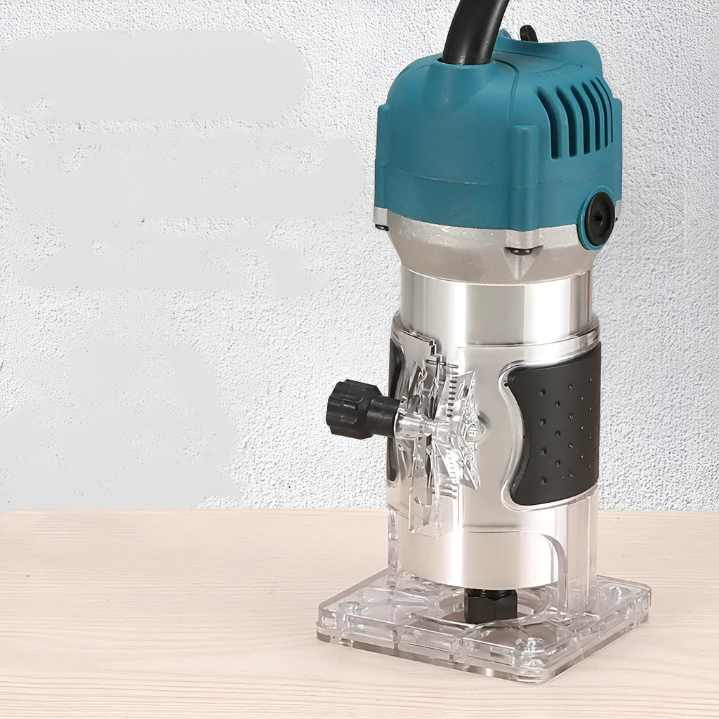 800W electric wood polishing trimmer with aluminium body on a workshop bench.