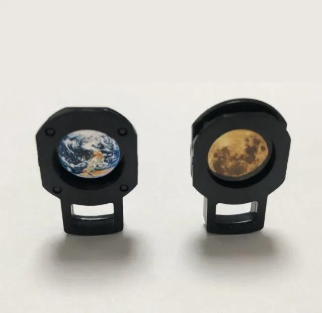 Star projector lamp showing Earth and Moon projection effects with adjustable bracket and USB power connection