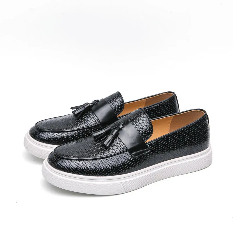 Men's black casual fringed leather shoes with a low heel and round toe on a white background.