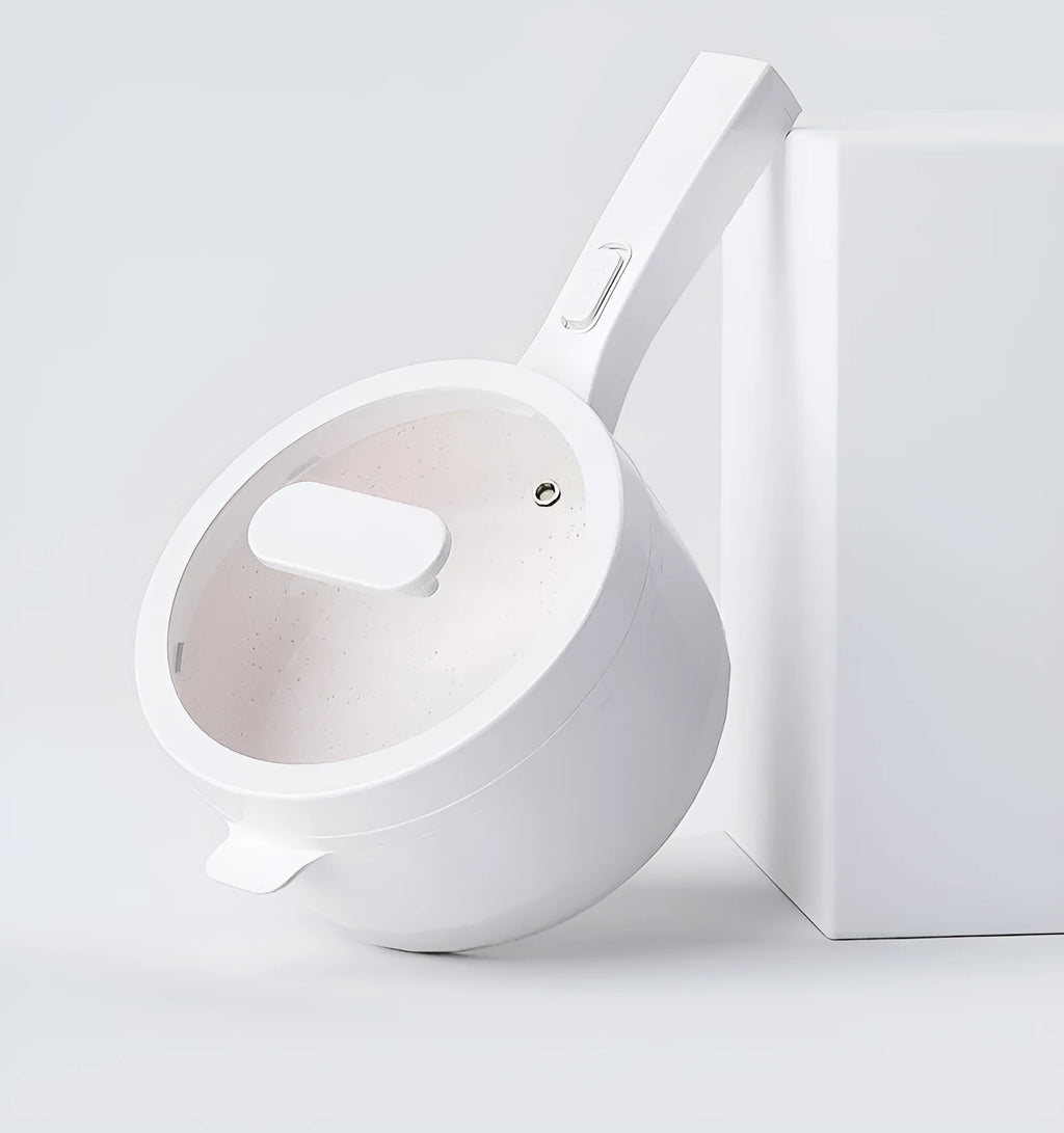 White electric cooking pot with 20cm mouth, 7cm depth, 700W mechanical control, on a dormitory desk