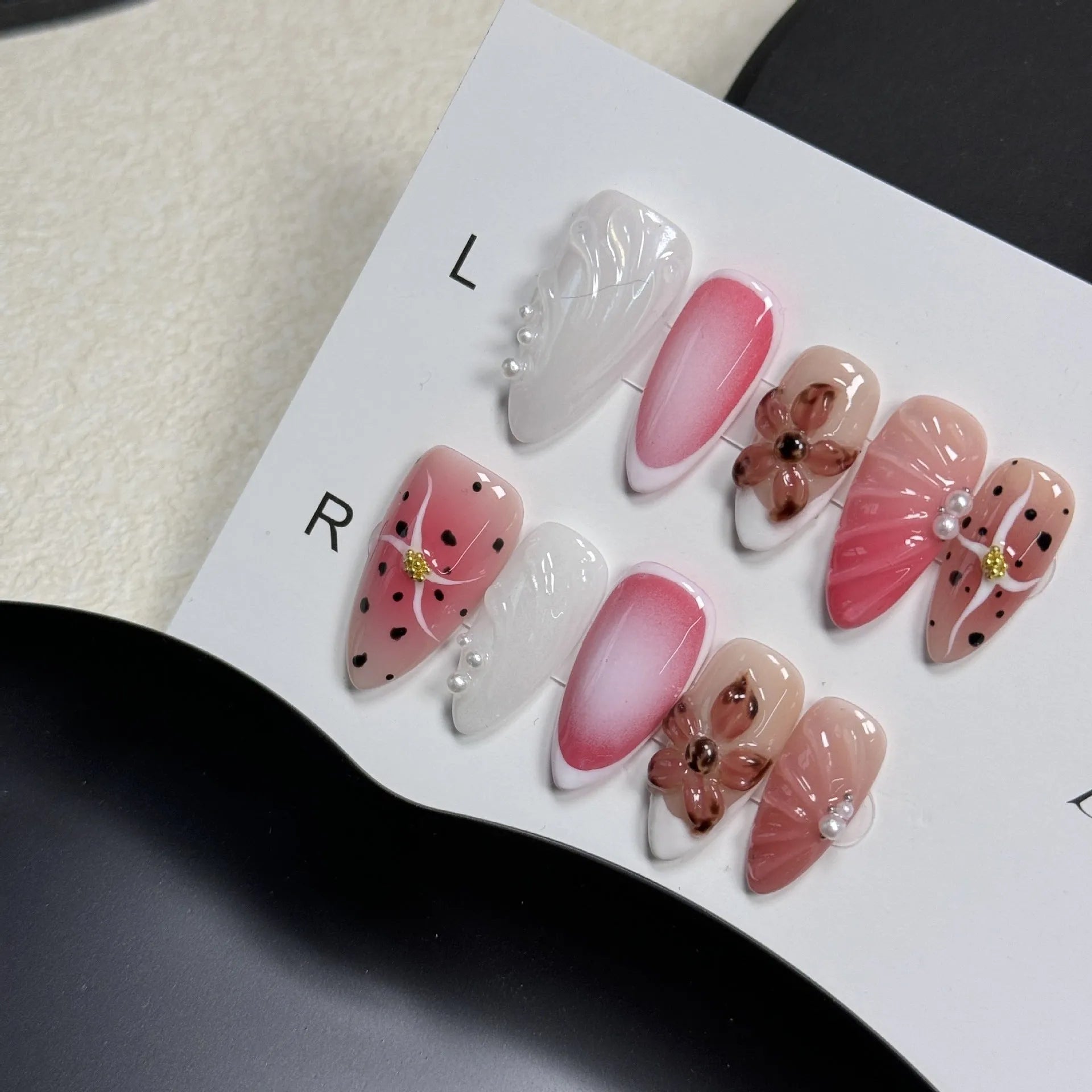 Hand-painted 3D carved nail beauty patches in embossed candy patterns on almond-shaped nails.