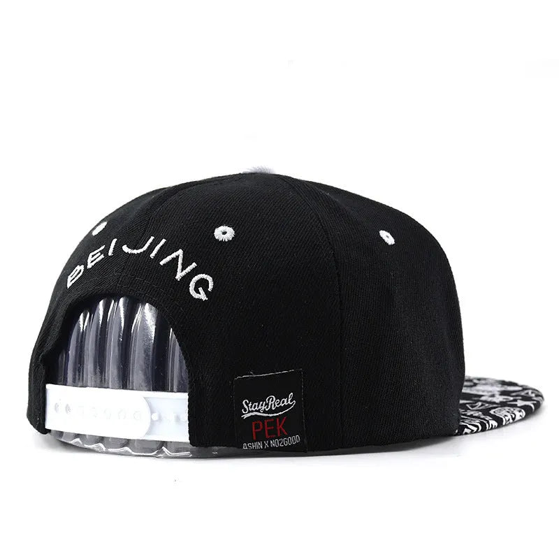 Cotton baseball cap with embroidered letters in black and white colour options