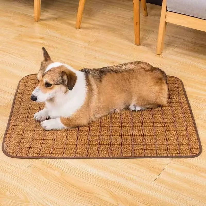 Brown rattan fibre summer cooling mat for dogs on a wooden floor.
