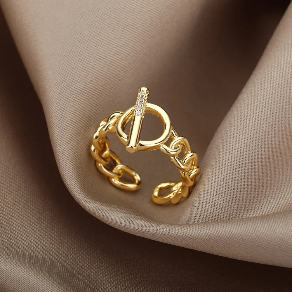 Gold plated copper adjustable open ring with zirconia inlay and OT buckle design