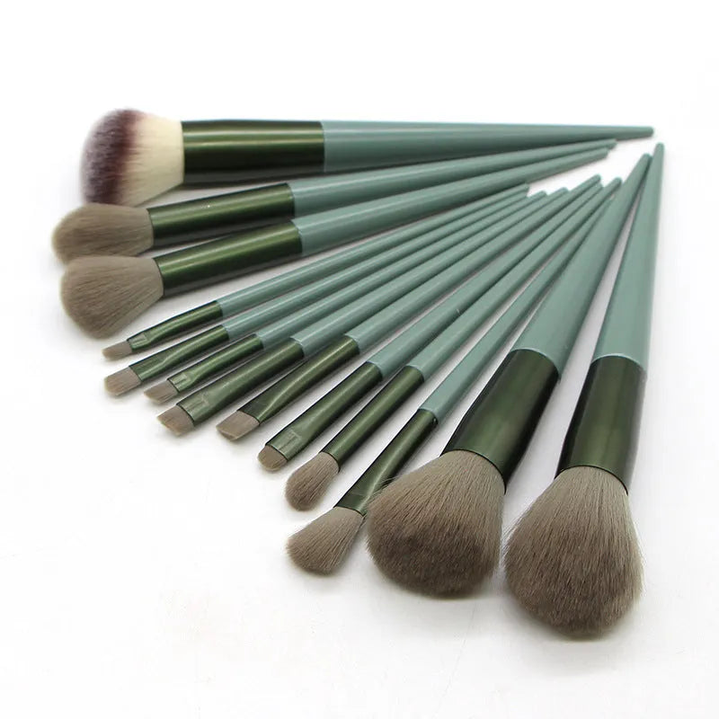 13 piece green makeup brush set with man-made fibre bristles and plastic handles