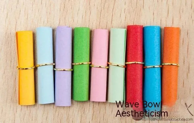 Colourful mini paper scrolls with eyelets in multiple sizes for drift bottle messages