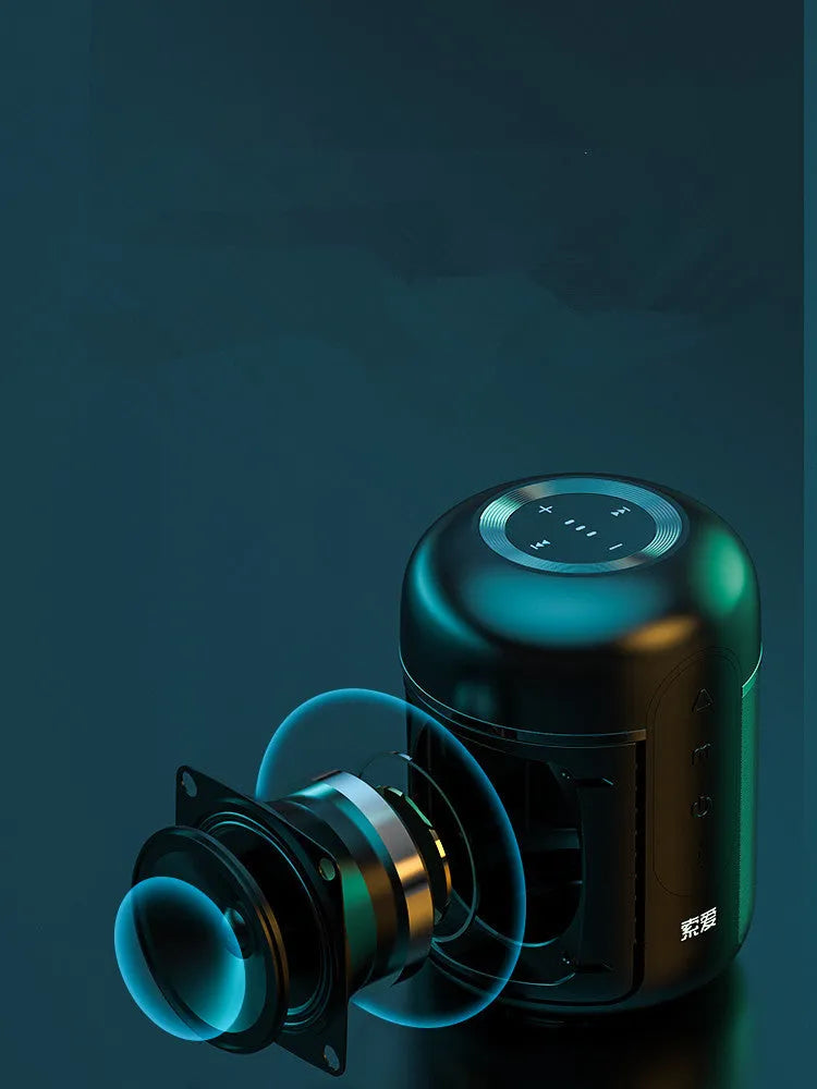 Black portable wireless Bluetooth speaker showing front grille and compact size.