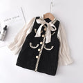 Children's black princess dress with long sleeves and stitching design on polyester fabric