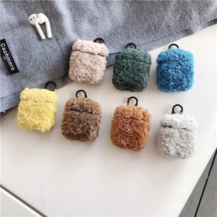 Simple Lamb hard plastic AirPods cover with plush interior in blue, shown next to brown and grey options.